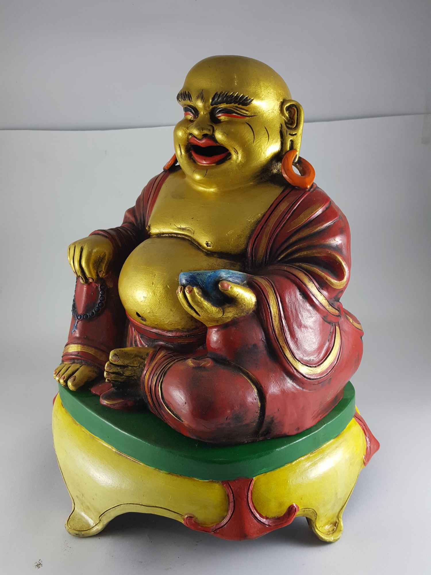 Clay Statue Of Laughing Buddha made In Nepal, handmade, painted