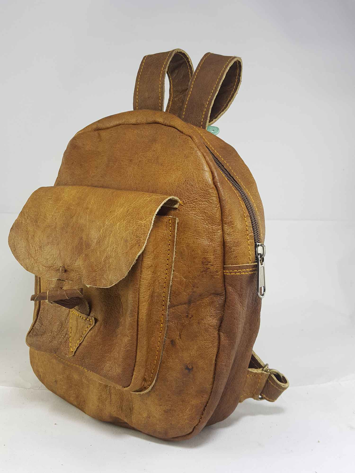 Himalayan Yak Leather Backpack Bag 2 Pocket, 1 Zip, leather Button Lock