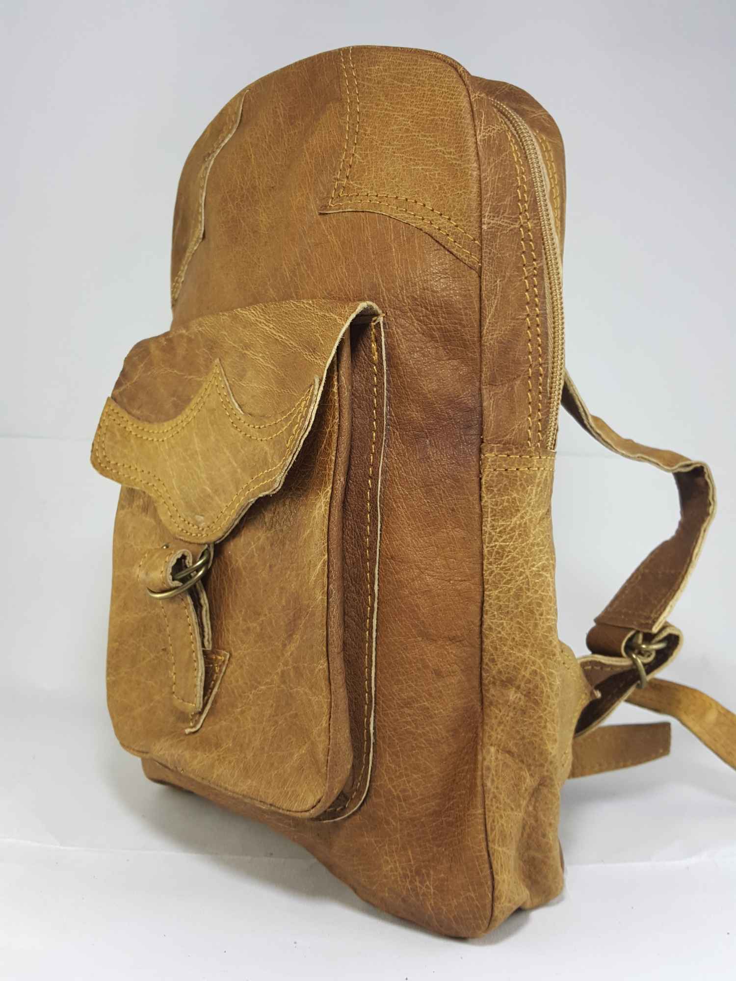 Himalayan Yak Leather Backpack Bag 2 Pocket, 1 Zip, leather Stripe Lock On Metal Ring.