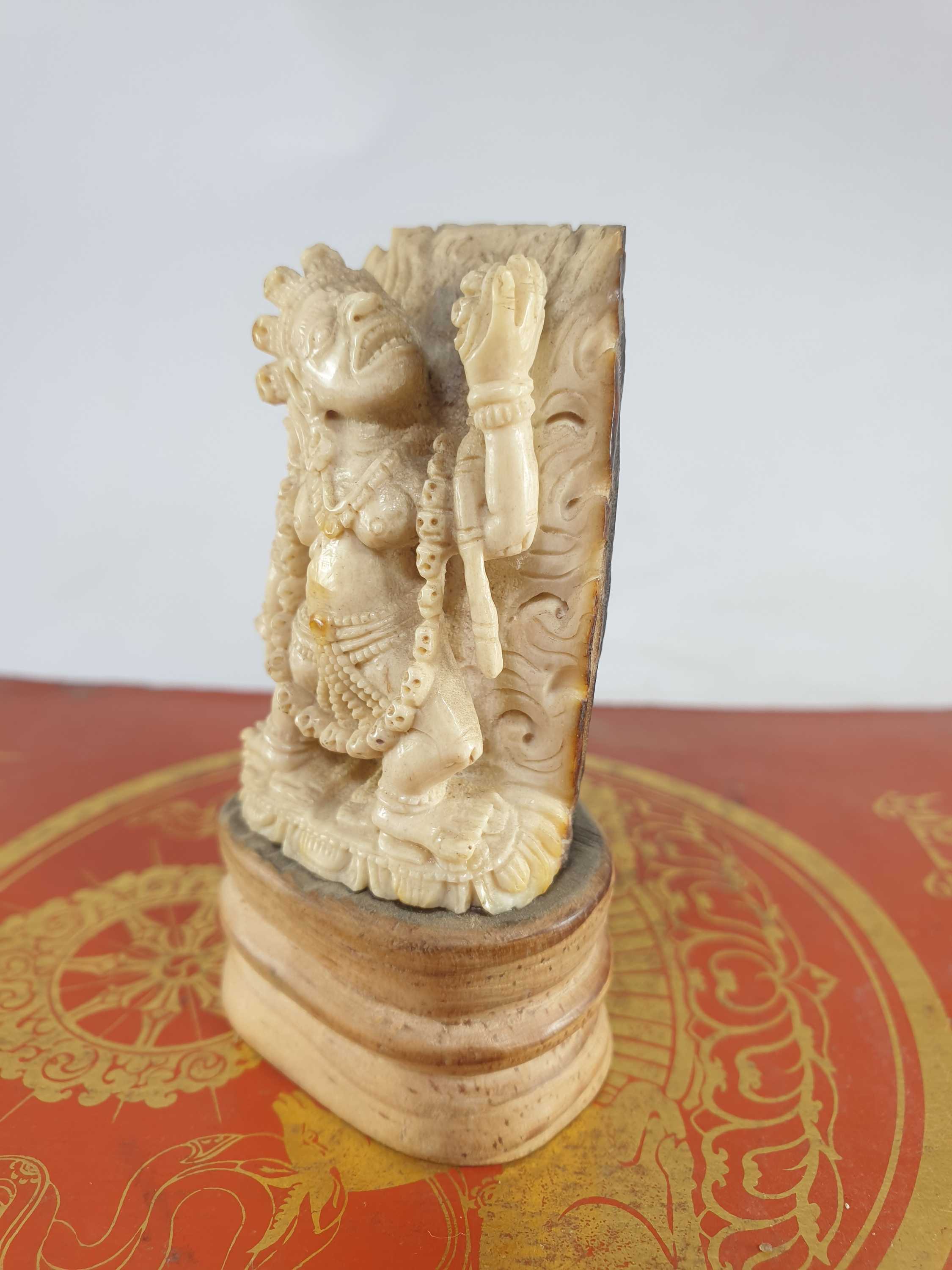 Buddhist Vajrayogini Carved In Yak Bone, On A Wooden Stand