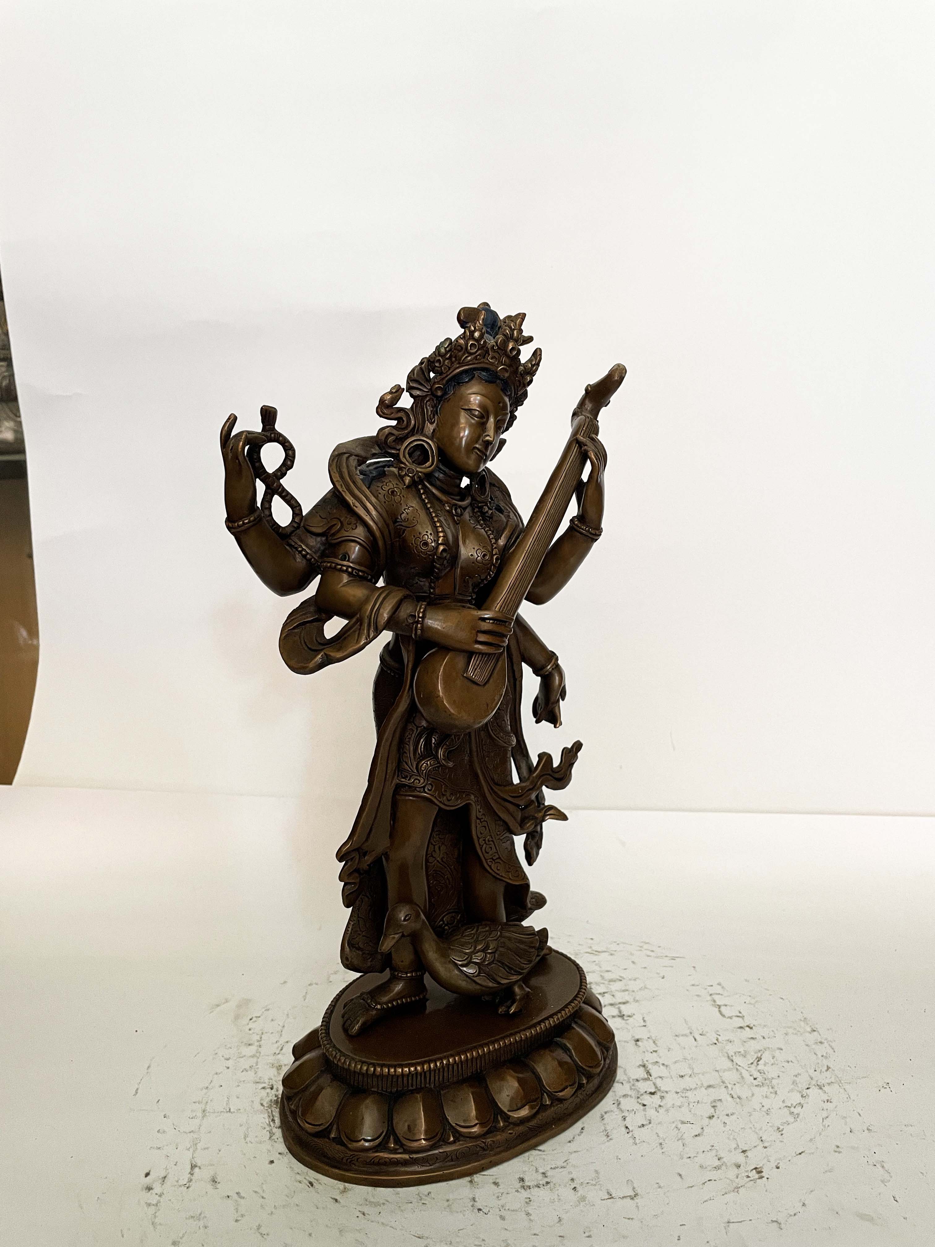 Buddhist Statue Of Standing Saraswati, chocolate Oxidized