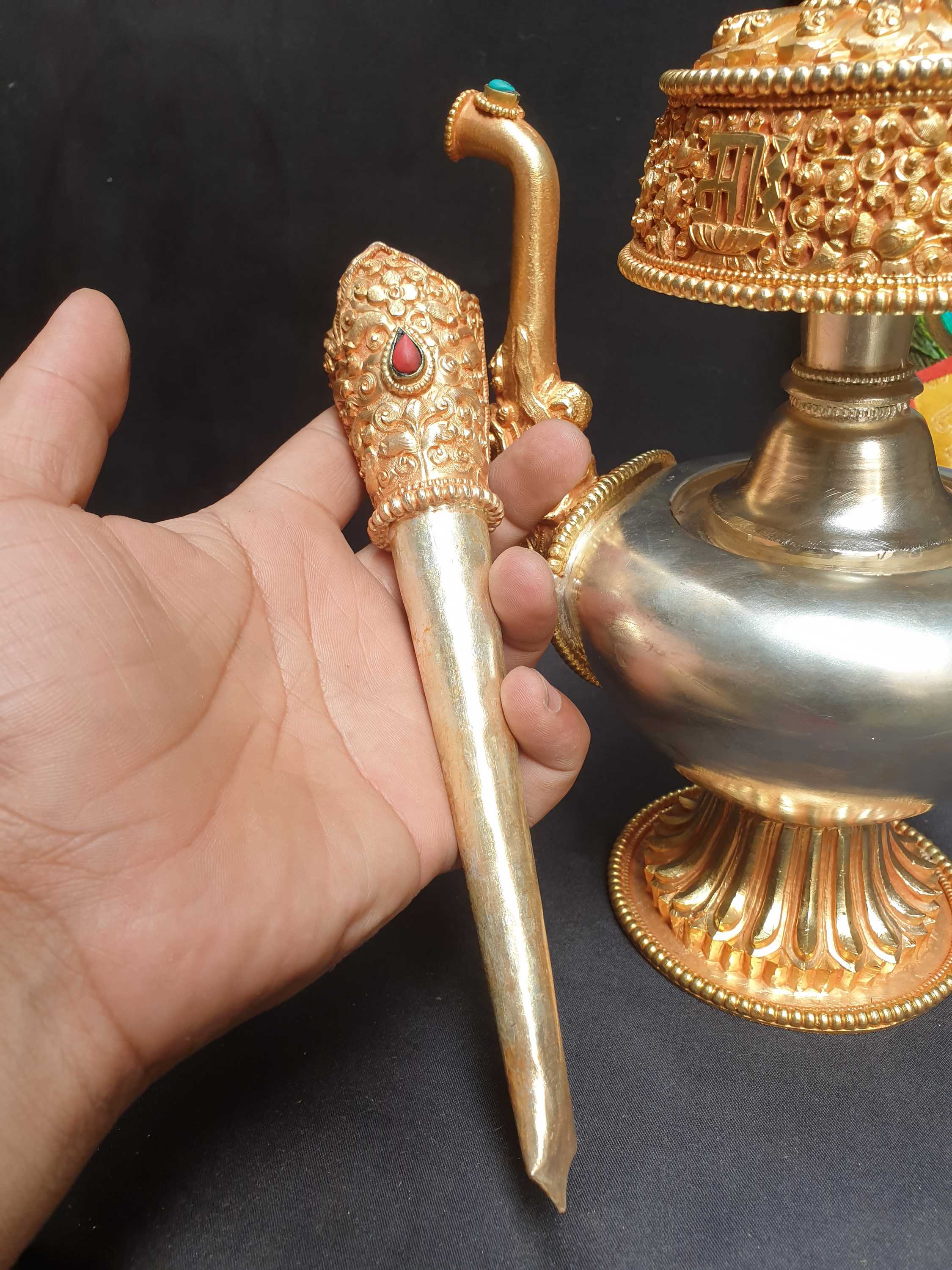 hq, large Copper Bhumpa- Bhumba. Fine Carving, partly Gold Plated, Silver Plated, Stone Setting, With Peacock Feather