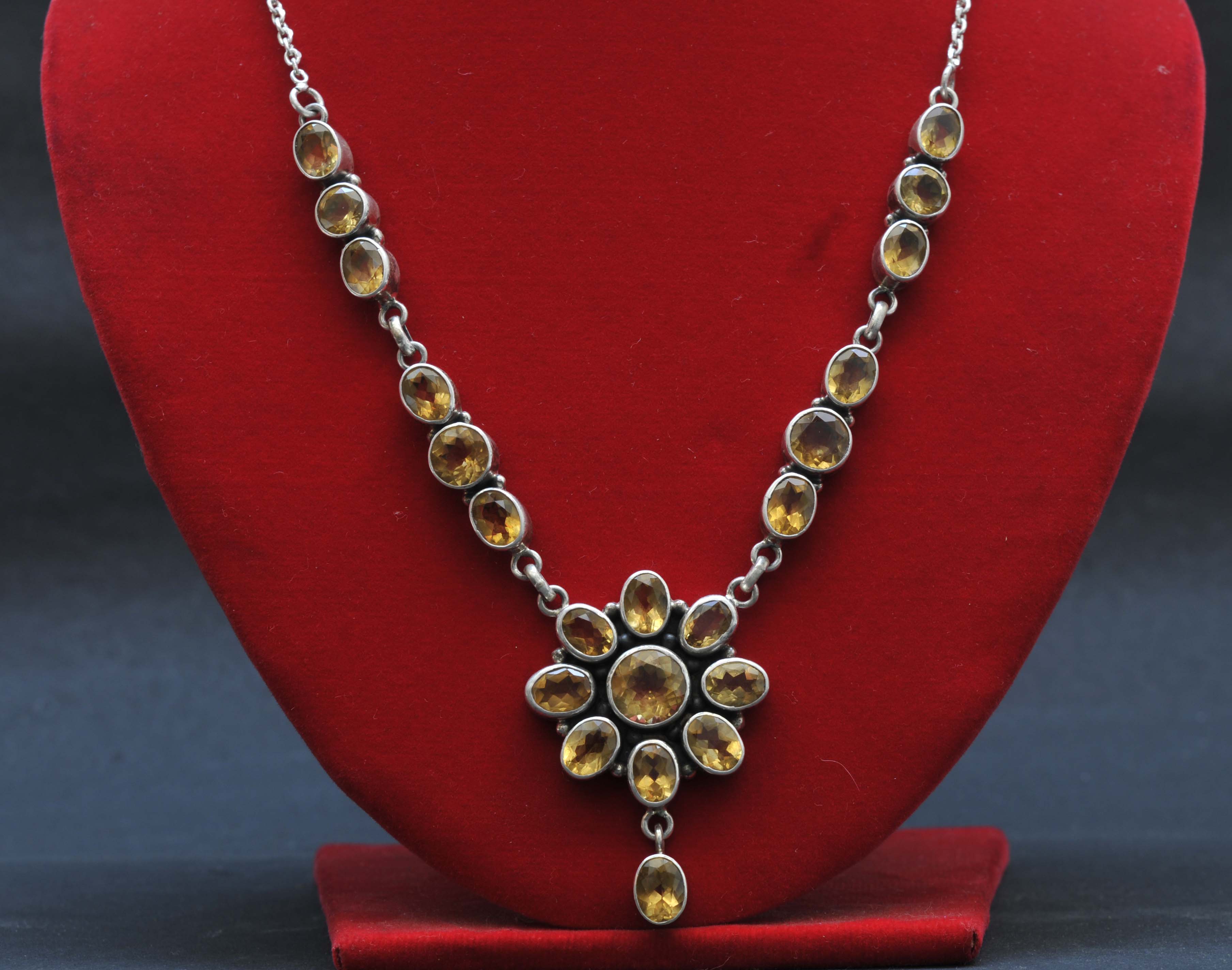 Designer Silver Necklace Of Yellow Jewel Design .