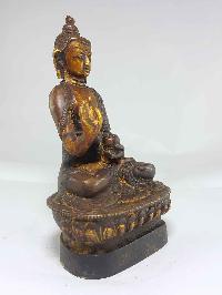 Brass Amoghasiddhi Buddha Antique Finishing With Wooden Base